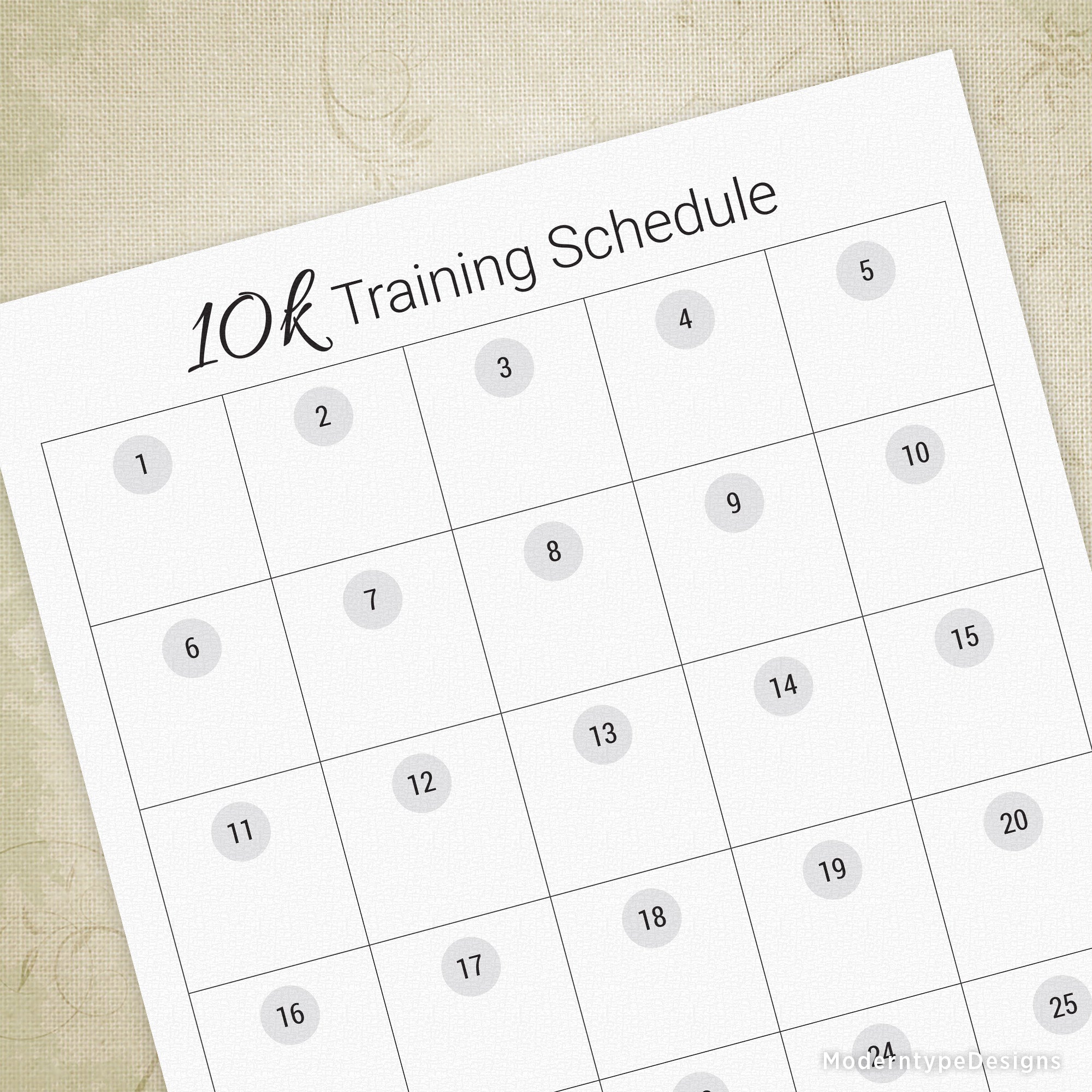 A printable 10k training schedule with blank spaces for tracking exercise and distances, with the text '10K TRAINING SCHEDULE' at the top.