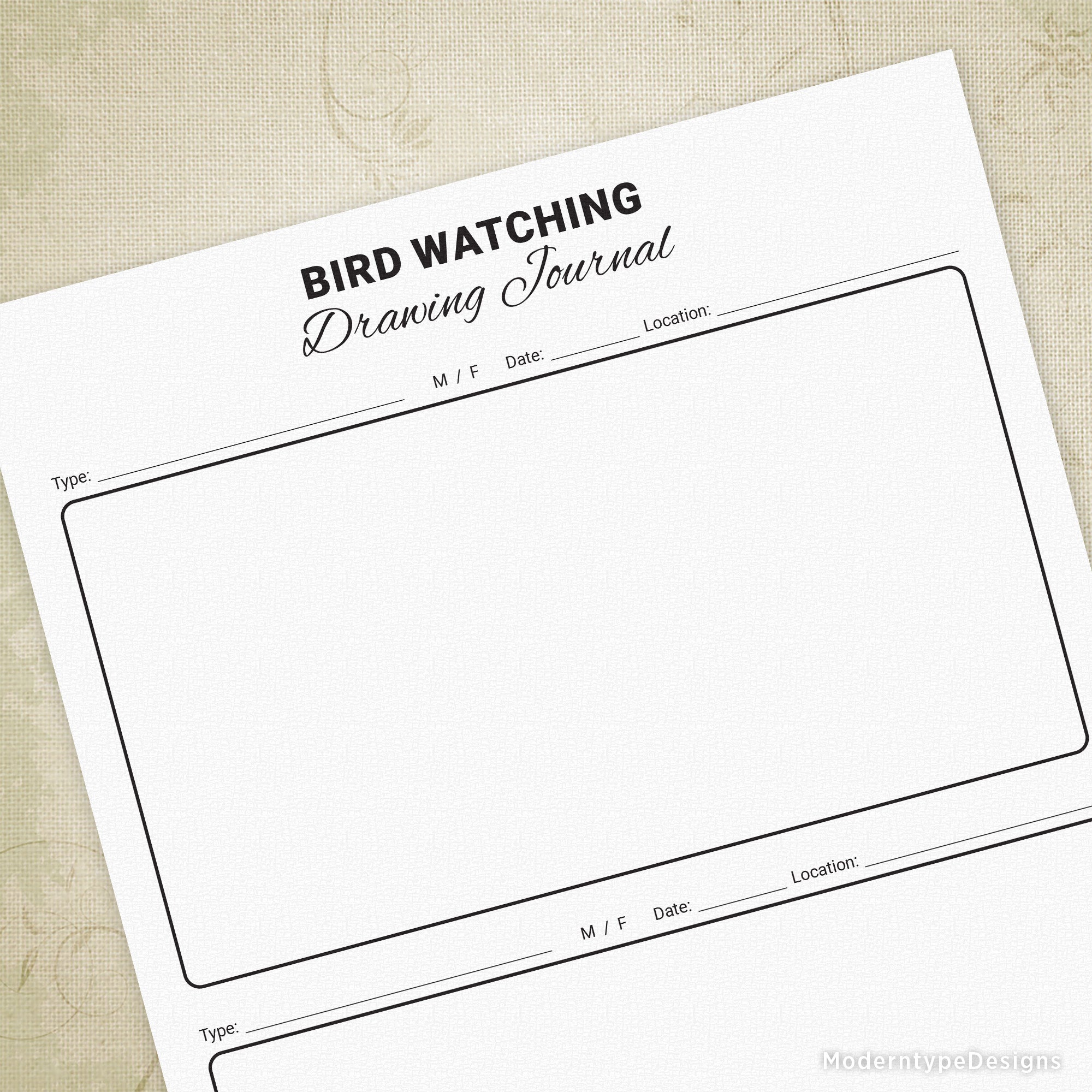 A printed Bird Watching Drawing Journal entry page laid on a surface, featuring two spaces to draw birds with labels for date and location.