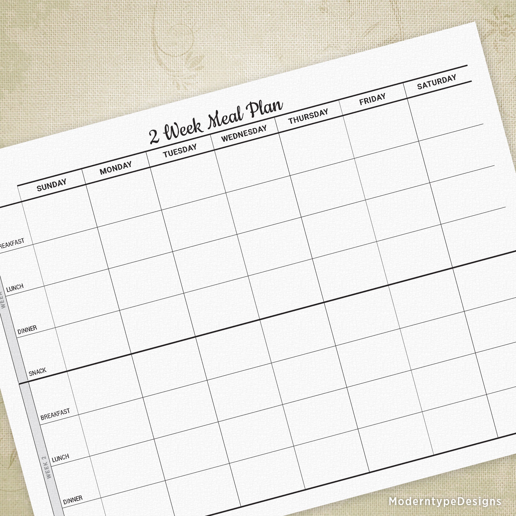 Write out your next 2 weeks' worth of breakfast, lunch, dinner, and snacks with this two Week Meal Plan Printable PDF.