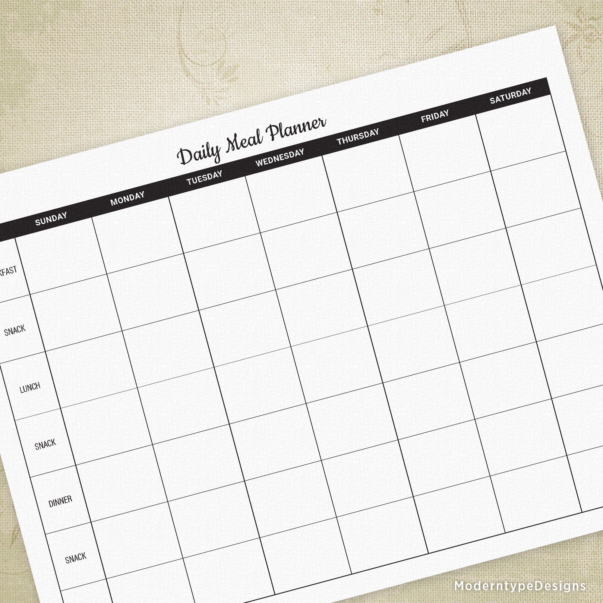 A printable daily meal planner with the days of the week across the top and various meal categories down the side, including lunch and snack. The planner is in landscape orientation and has white margins.