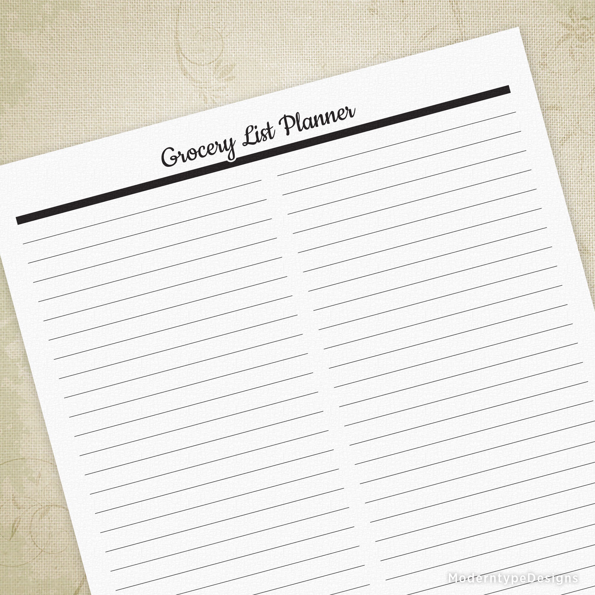 A printable grocery list sheet with the title 'Grocery List Planner' written at the top. The sheet is labeled with 'Grocery List' and has a black border and white background with lines for writing.