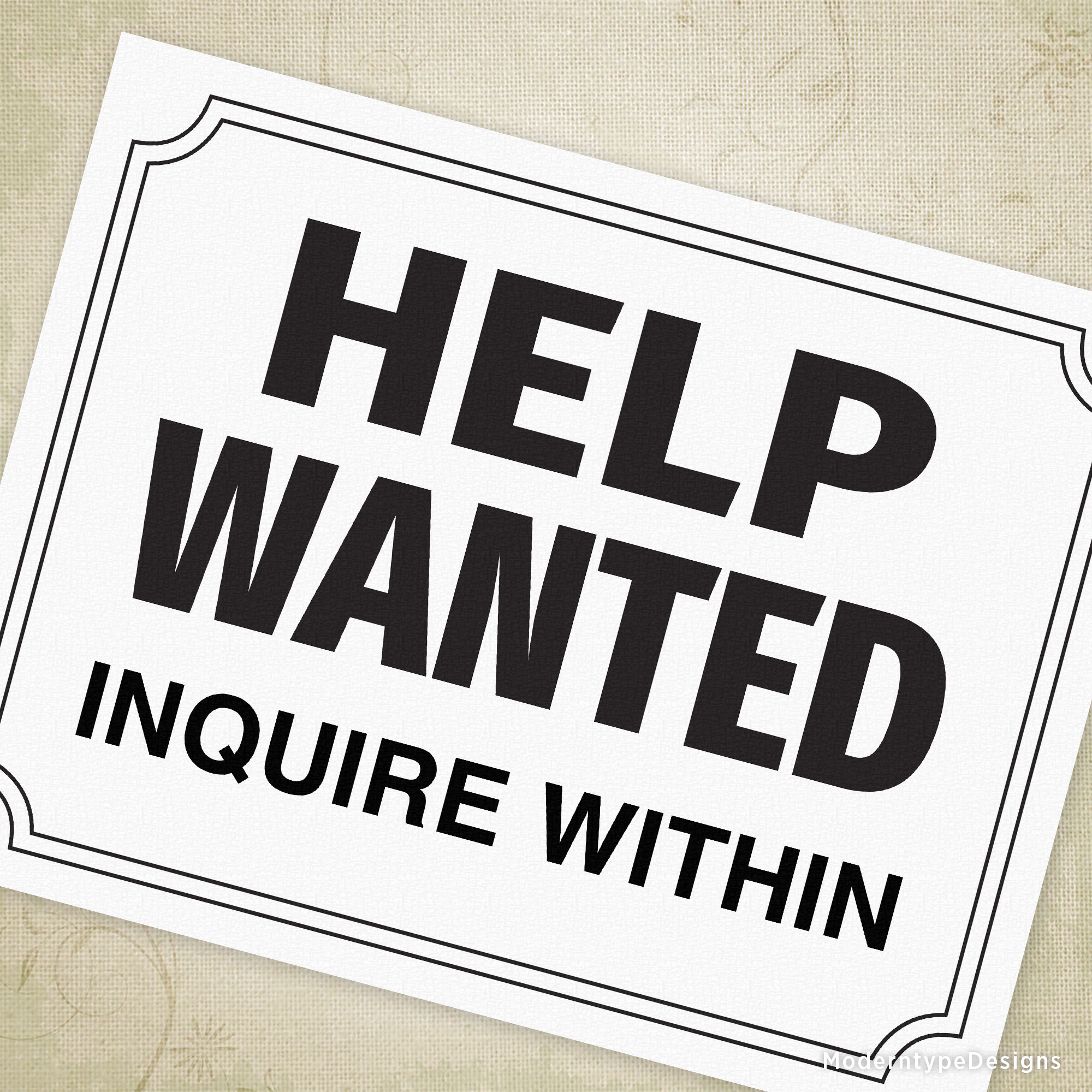 A printable help wanted sign with editable text field, displaying the words 'HELP WANTED' and 'INQUIRE WITHIN' in bold and a smaller text area below for personalized information.