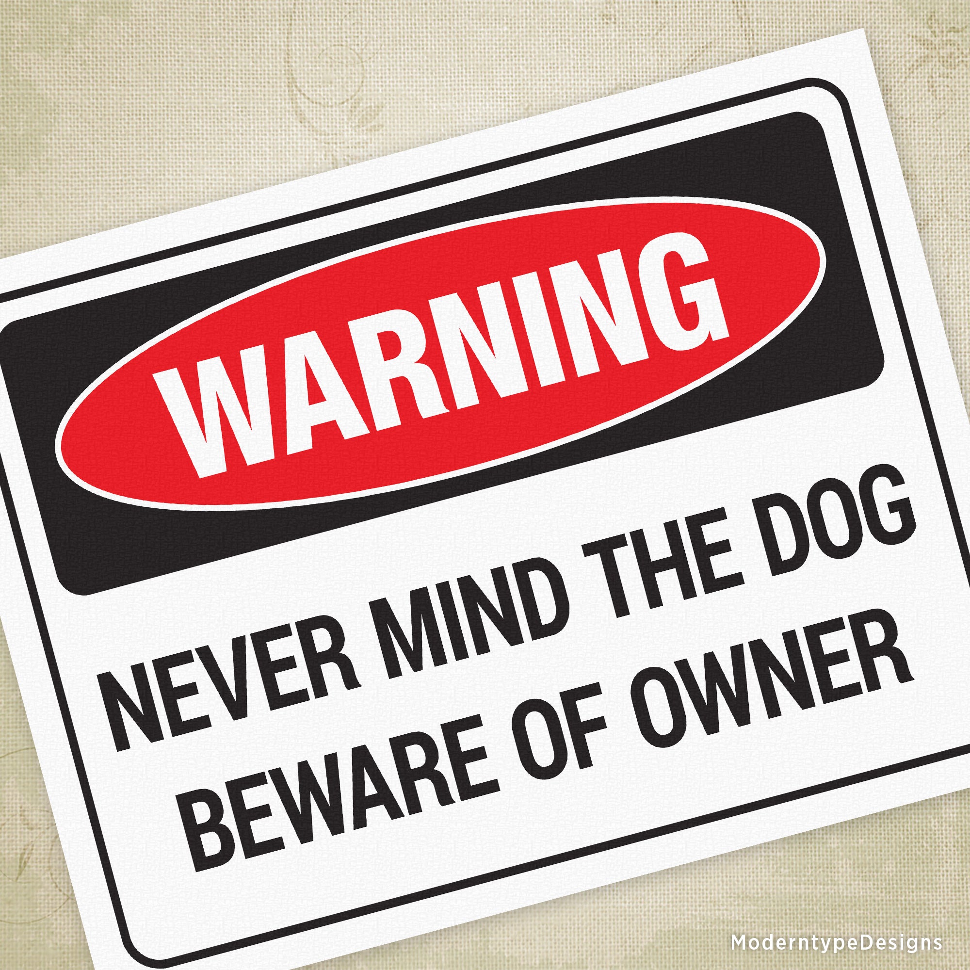 A printable sign with a black and red 'WARNING NEVER MIND THE DOG BEWARE OF OWNER' message, with white margins.