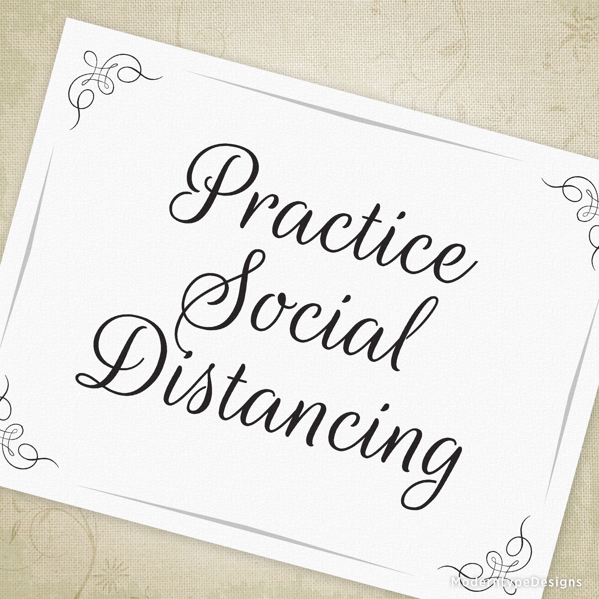 A printable sign with the text 'PRACTICE SOCIAL DISTANCING' in bold, black script, surrounded by decorative white margins on a white background.