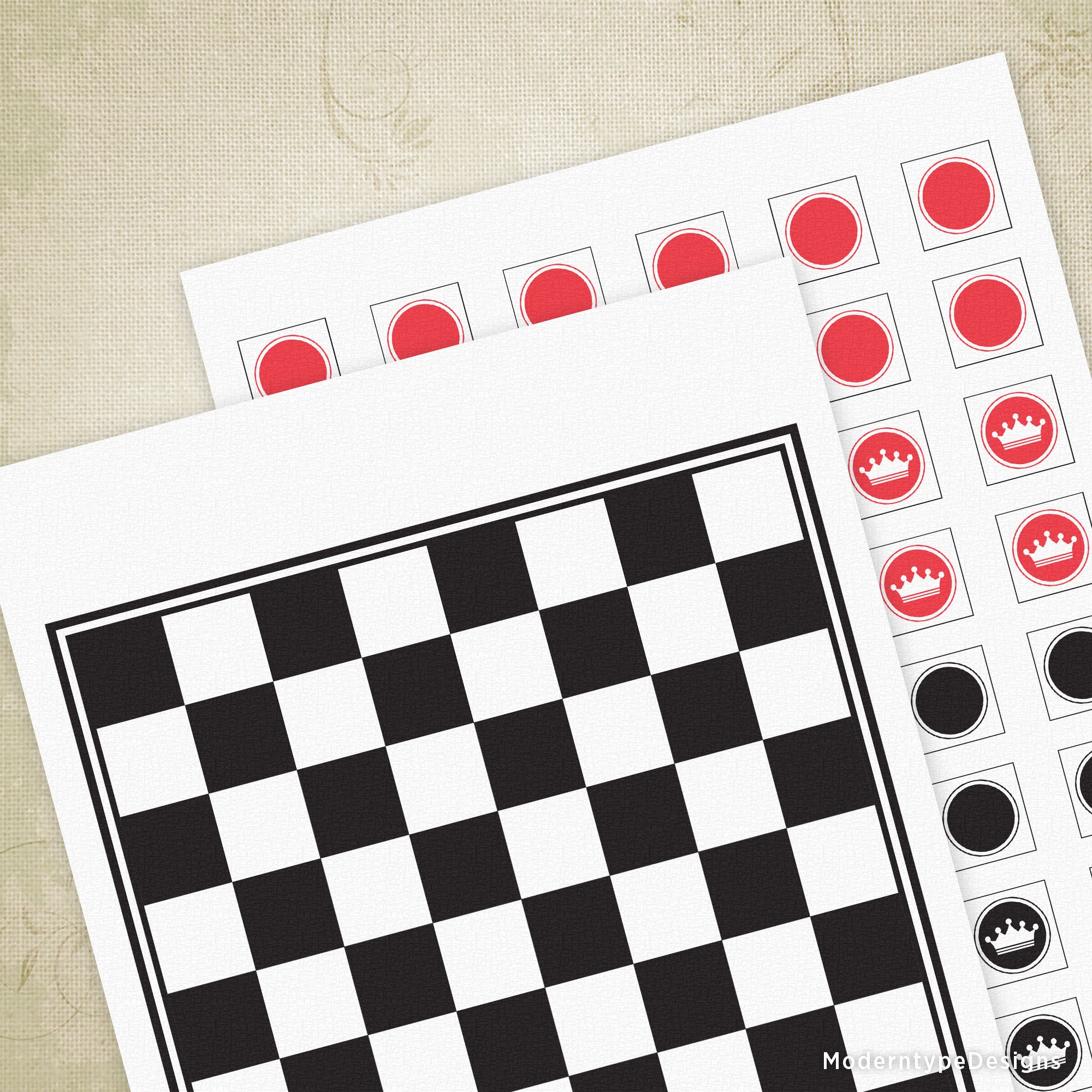 Checkered paper with red and black circular stickers on a beige surface